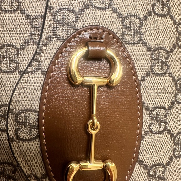 Gucci Beige and Brown Crossbody Bag with Gold Accents
Like new condition - Picture 2 of 3